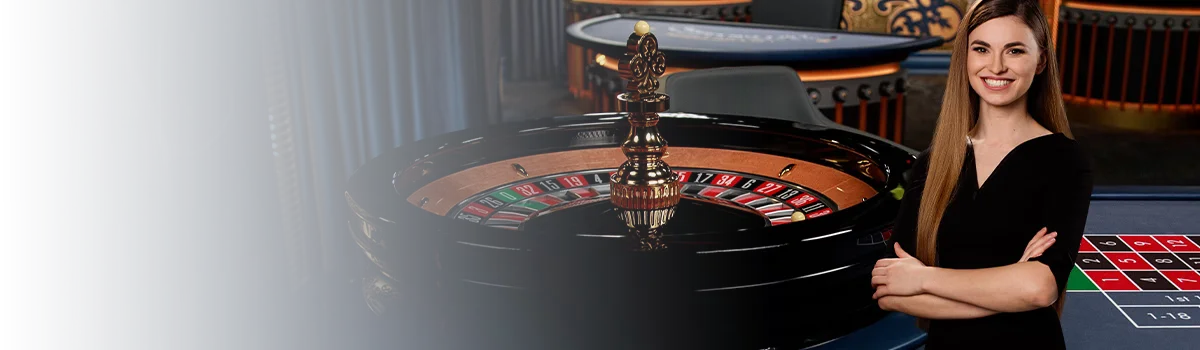 Expert dealer in a luxury live studio with high-end roulette equipment — the elite streaming quality KK333 provides in BD