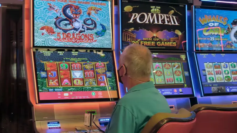 Happy BD player pointing at a glowing digital entrance among neon wagering symbols – showing effortless KK333 profile recovery